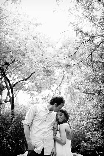 engagement portraits on a bridge at Turtle Creek Park in Highland park by Dallas wedding photographer Allison Davis