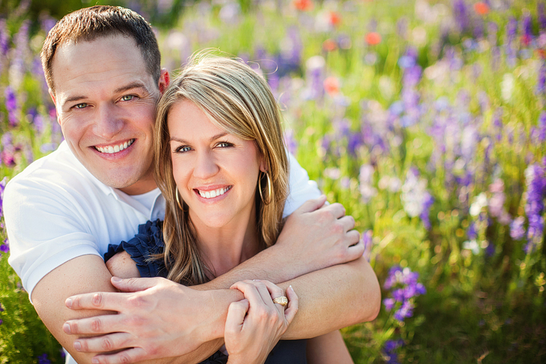 Romantic engagement portraits at Prairie Creek Park by North Texas wedding photographer Allison Davis Photography in a wild flower field