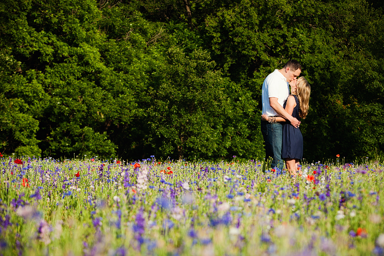 Romantic engagement portraits at Prairie Creek Park by Dallas wedding photographer Allison Davis Photography in a wild flower field