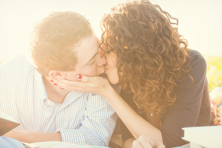 North Texas engagement portraits with a couple on a picnic playing games by Allison Davis Photography