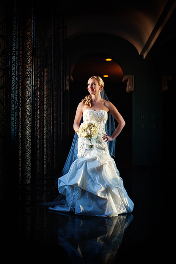 beautiful bridal portraits at the Fort Worth Club in the mirror hallway