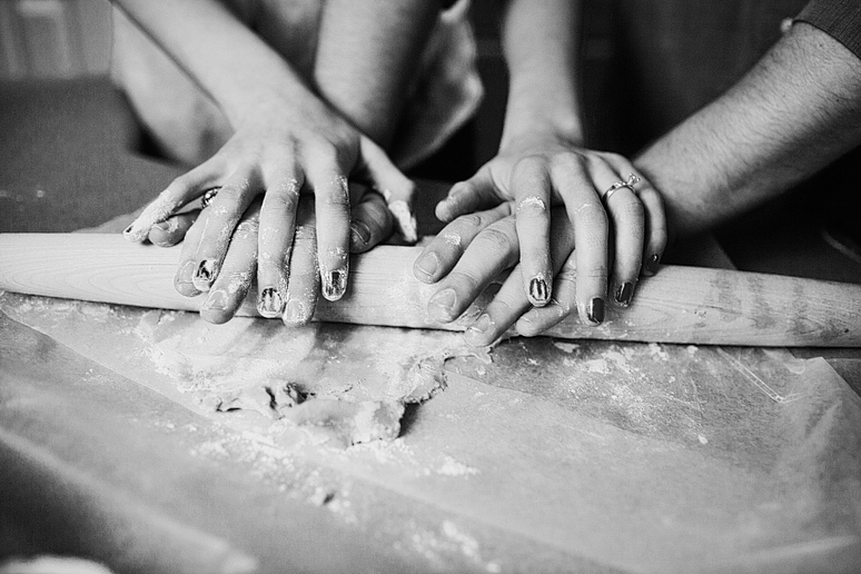 baking in the kitchen for engagement portraits