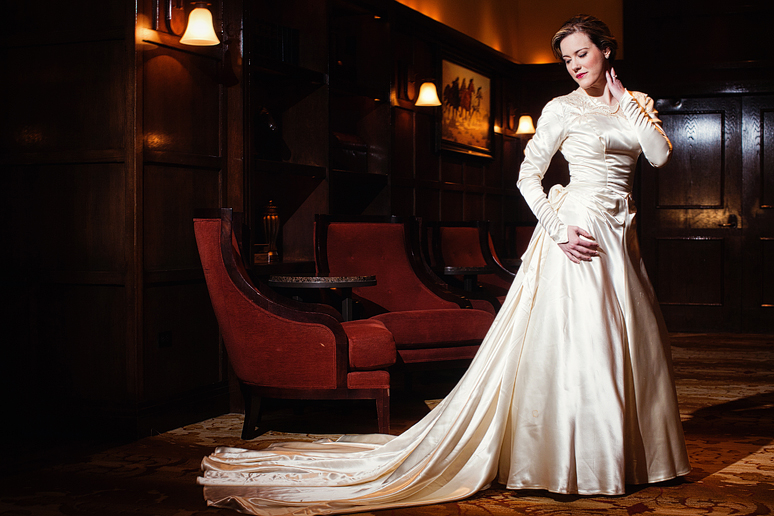 Bride wearing her mother's wedding dress for her bridal portraits at the Westin Stonebriar Resort Hotel by Allison Davis Photography