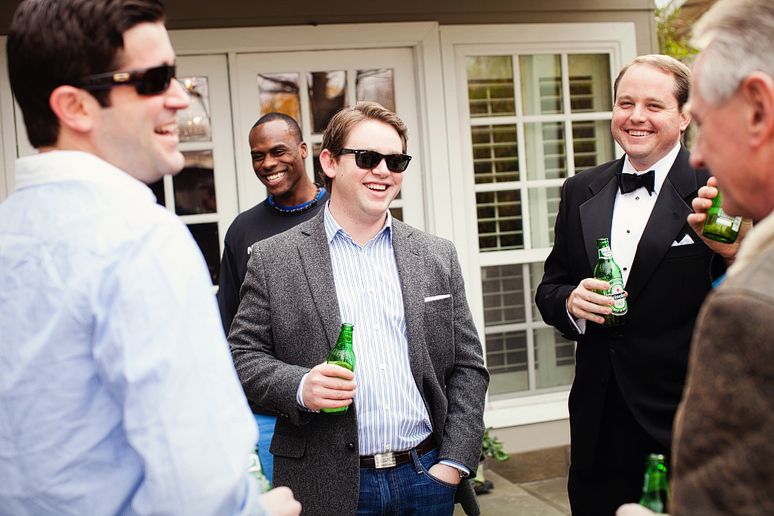 groom getting ready for wedding at University Christian Church