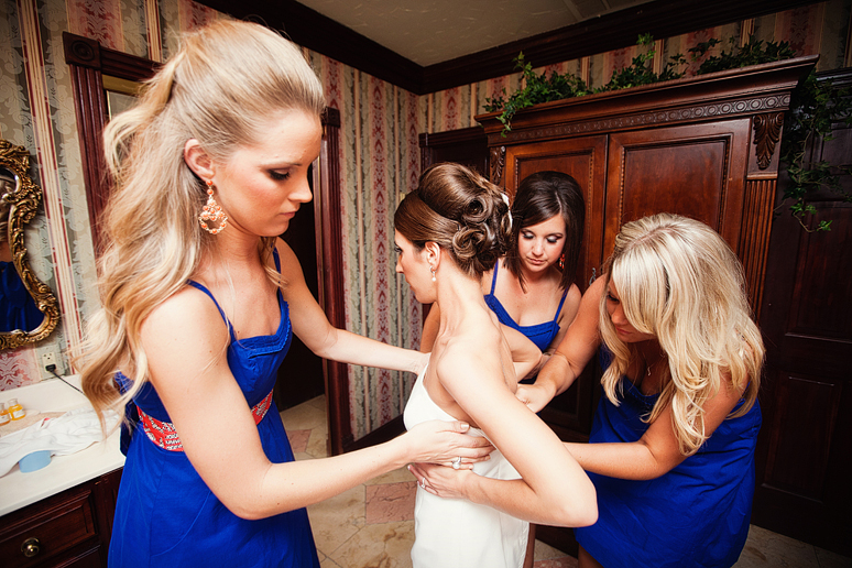 photographs of the bride getting ready on her wedding day in the bridal suite at the Maple Manor hotel