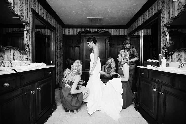 photographs of the bride getting ready on her wedding day in the bridal suite at the Maple Manor hotel