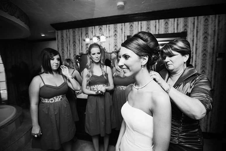 photographs of the bride getting ready on her wedding day in the bridal suite at the Maple Manor hotel