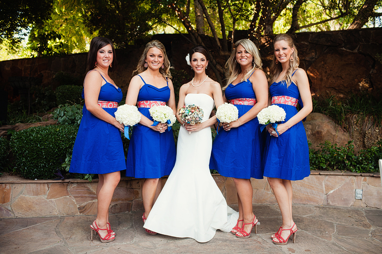 wedding day portraits of the bridesmaids in Anthropologie dresses in the Maple Manor Garden wedding ceremony space in downtown Dallas
