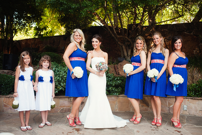 wedding day portraits of the bridesmaids in Anthropologie dresses in the Maple Manor Garden wedding ceremony space in downtown Dallas