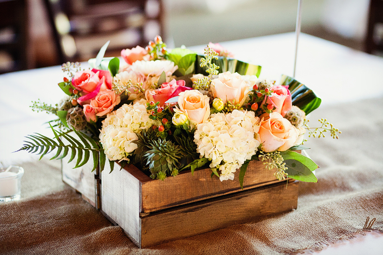 wedding day details of the rustic-inspired table centerpieces in wood boxes at Prestonwood