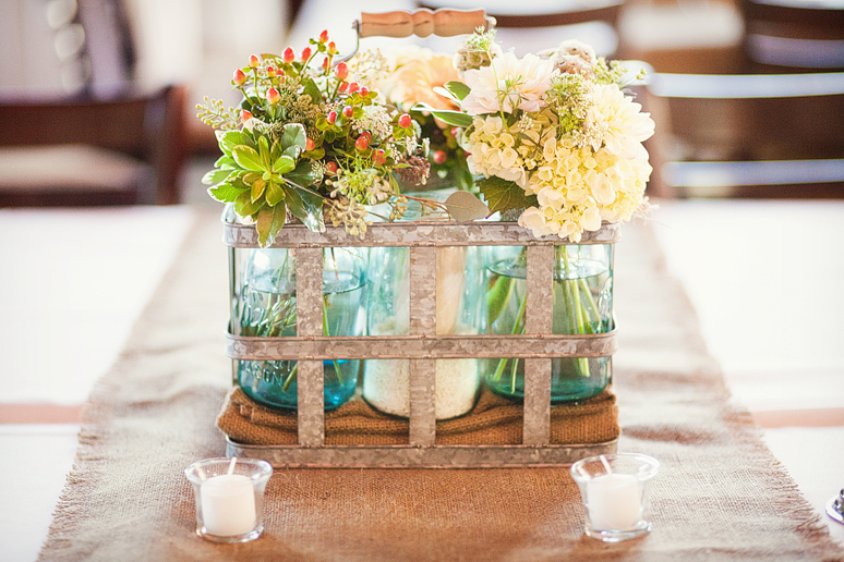 wedding day details of the rusticinspired table centerpieces with mason 
