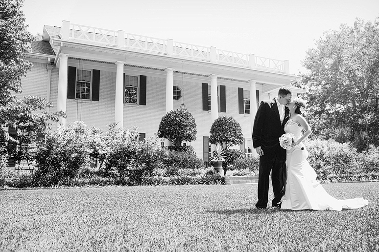 romantic wedding day portraits of the bride and groom by North Texas wedding photographer Allison Davis Photography in front of a private residence