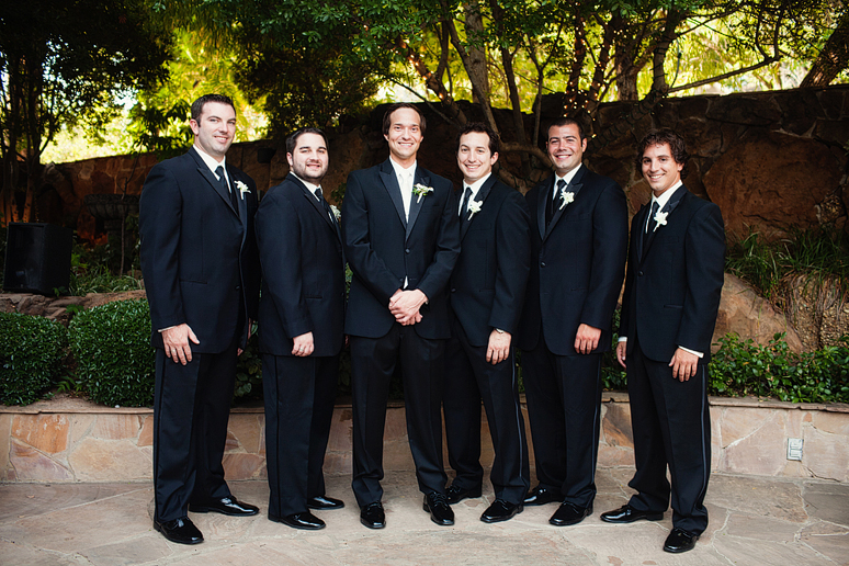 wedding day portraits of the groomsmen in the Maple Manor Garden wedding ceremony space in downtown Dallas