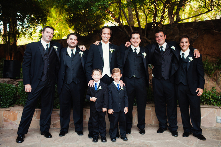 wedding day portraits of the groomsmen in the Maple Manor Garden wedding ceremony space in downtown Dallas