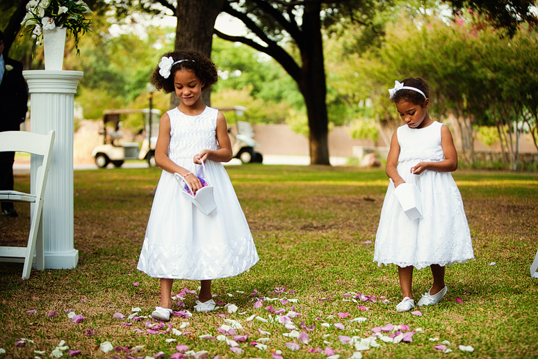 flowergirls throwing petals during dallas wedding photographer outdoor wedding photography at a Dallas country club