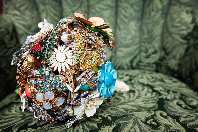 photographs of wedding day details of the brooch bouquet for the bride