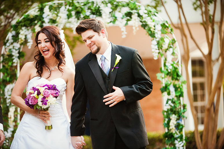 happy couple at outdoor wedding ceremony at canyon creek country club in richardson texas