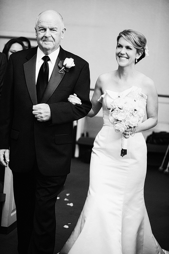 bride walking down the aisle at a baptist Church wedding by Dallas wedding photographer Allison Davis