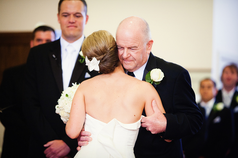 father giving his daughter away at baptist Church wedding by Dallas wedding photographer Allison Davis