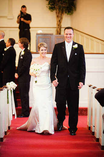 bride and groom wedding ceremony exit at baptist Church wedding by Dallas wedding photographer Allison Davis