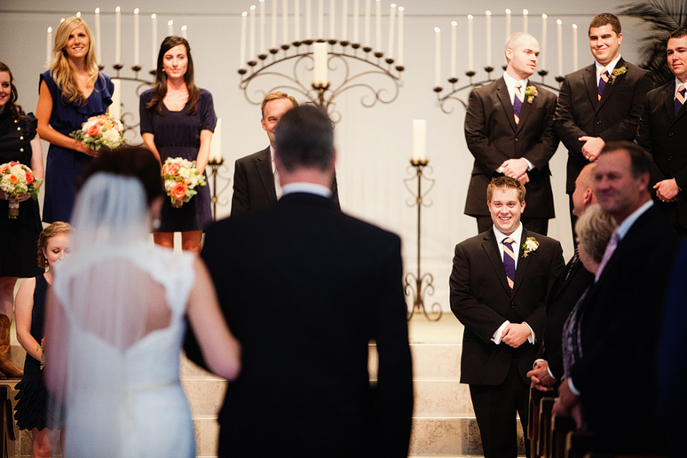groom watching his bride walk down the aisle at Prestonwood
