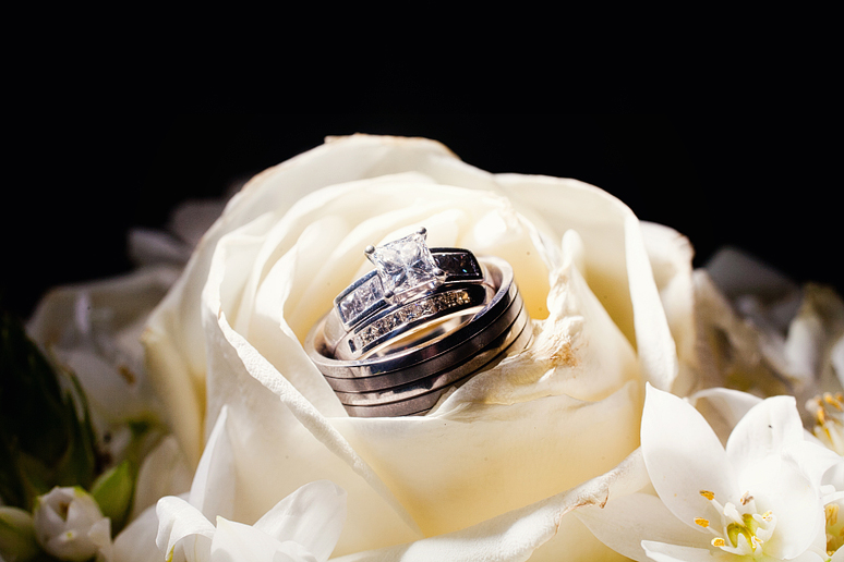 wedding reception details of the wedding rings by North Texas wedding photographer Allison Davis Photography