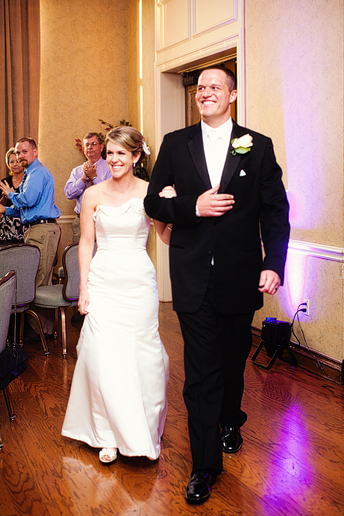 bride and groom entrance with purple uplighting at a country club wedding reception by Dallas wedding photographer Allison Davis Photography