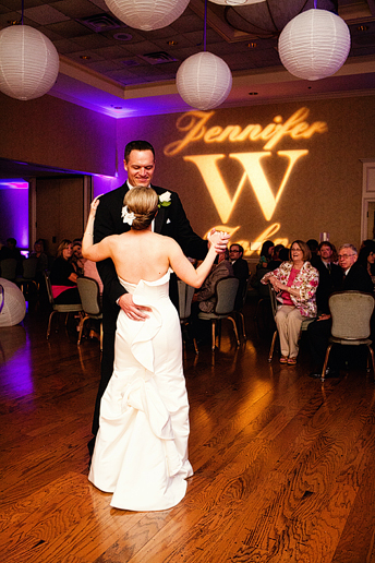 first dance with purple uplighting at a country club wedding reception by Dallas wedding photographer Allison Davis Photography