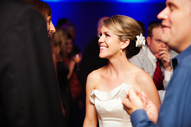 bride visiting with guests at a wedding reception at a country club photographed by Dallas wedding photographer Allison Davis Photography