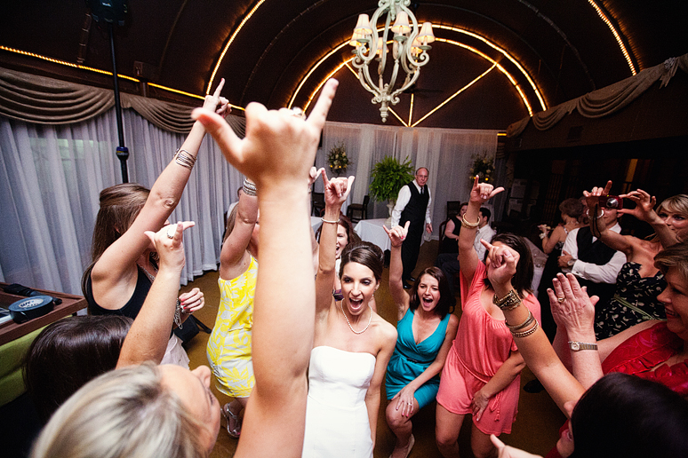 fun wedding reception sorority song singing at the downtown Dallas bed and breakfast hotel the Maple Manor