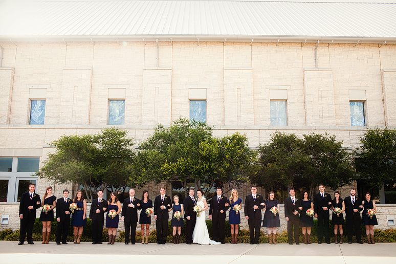 Large bridal party portrait outside the Prestonwood Chapel by Dallas wedding photographer Allison Davis