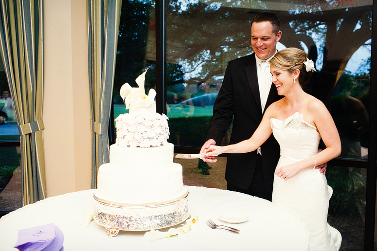 cake cutting at a wedding reception at a country club photographed by Dallas wedding photographer Allison Davis Photography