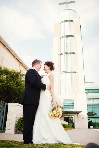 bride and groom portrait outside in front of the Prestonwood Chapel by Plano wedding photographer Allison Davis