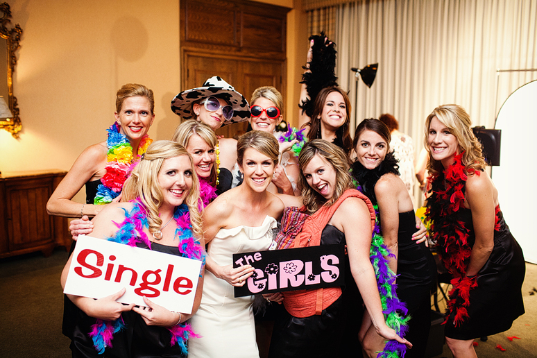 bride and friends at a photo booth at a wedding reception at a country club photographed by Dallas wedding photographer Allison Davis Photography