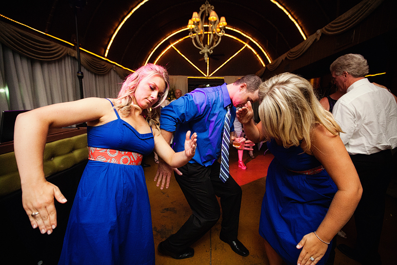 bridal party and guests dancing at a wedding reception at the downtown Dallas bed and breakfast hotel the Maple Manor
