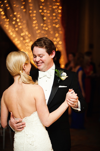 bride and groom's first dance at their wedding reception at the fort worth club
