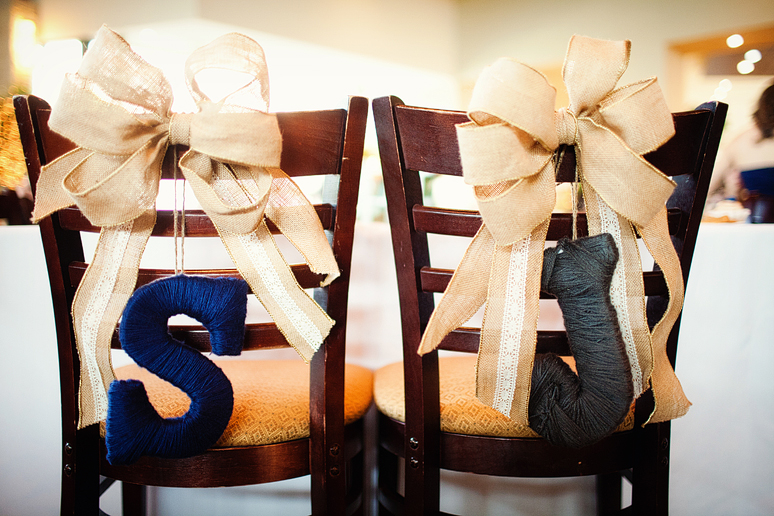 wedding reception detail photographs of the yarn wrapped bride and groom initials by Allison Davis Photography