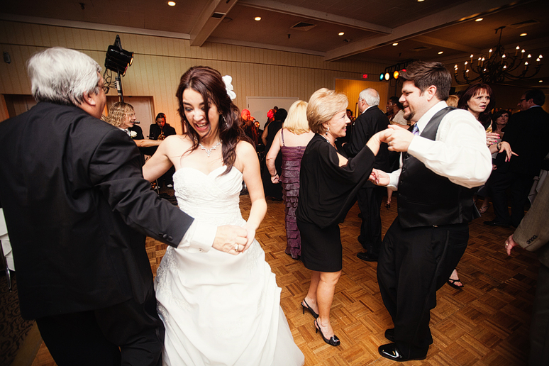 bride and groom dancing at their wedding reception at the canyon creek country club in richardson texas