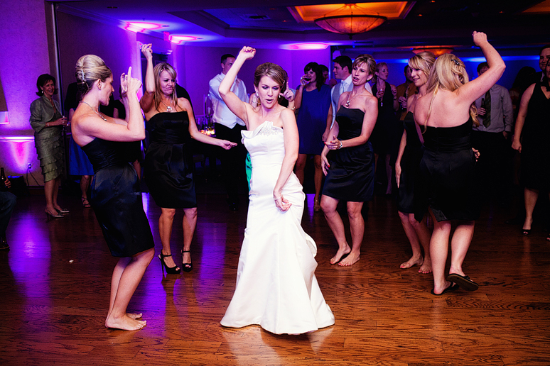 Bride dancing at a Dallas country club wedding reception by Plano wedding photographer Allison Davis Photography