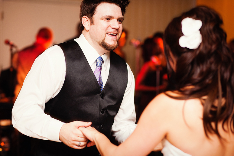 bride and groom dancing at their wedding reception at the canyon creek country club in richardson texas
