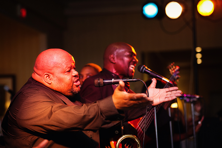 live band performing at a wedding reception at the canyon creek country club in richardson texas