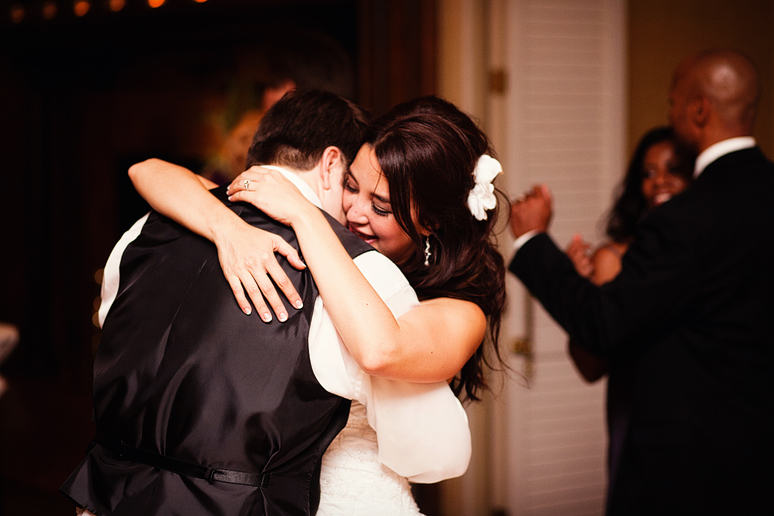 bride and groom dancing at their wedding reception at the canyon creek country club in richardson texas