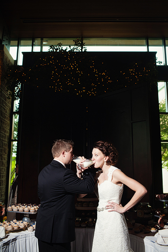 bride and groom toasts with milk at their wedding reception at Prestonwood Baptist Church