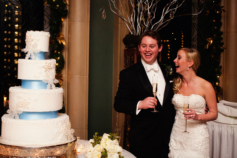cake cutting at the fort worth club at a wedding reception