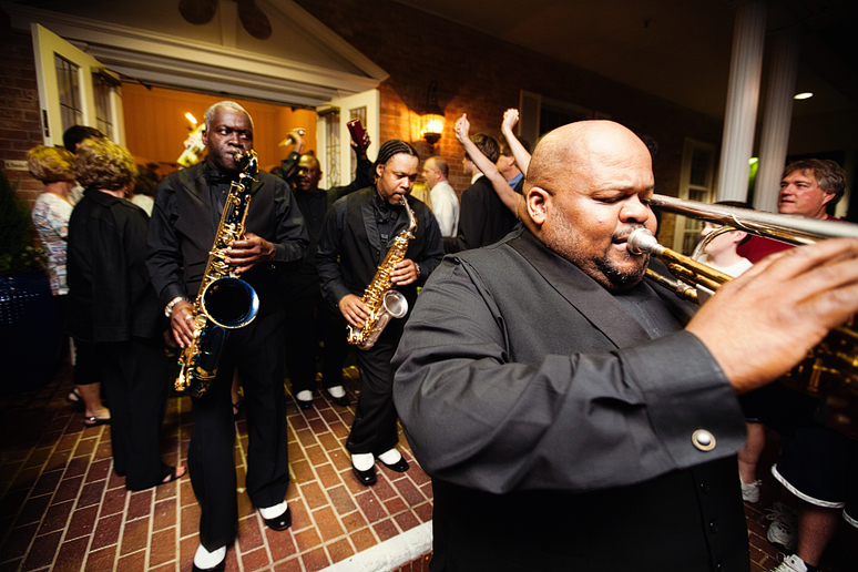 live band leading the bride and groom exit playing