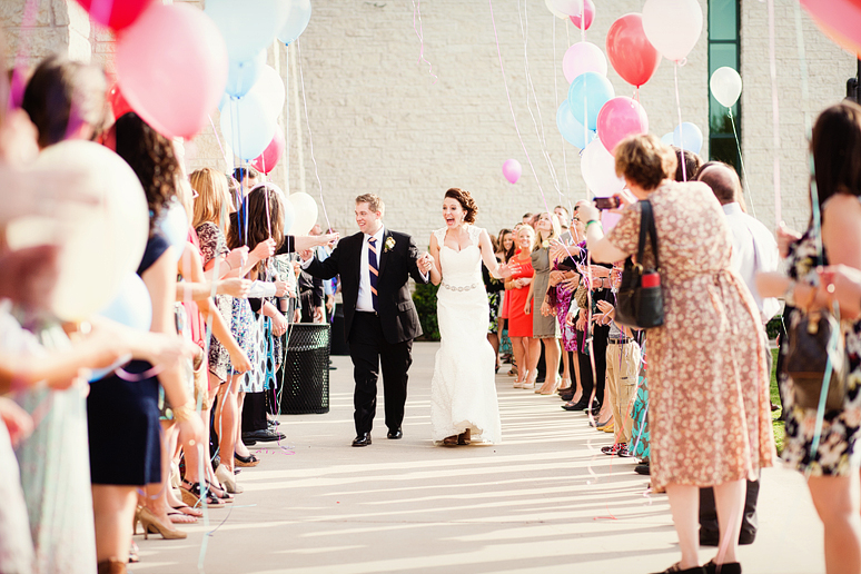 grand wedding exit with a balloon send off by Plano wedding photographer Allison Davis Photography at Prestonwood Baptist Church