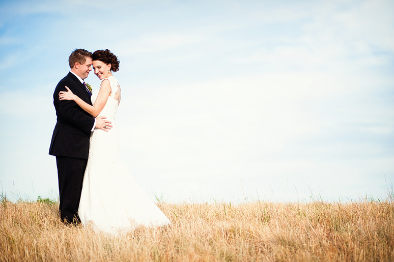 bride and groom on a beautiful hill by Plano wedding photographer Allison Davis Photography