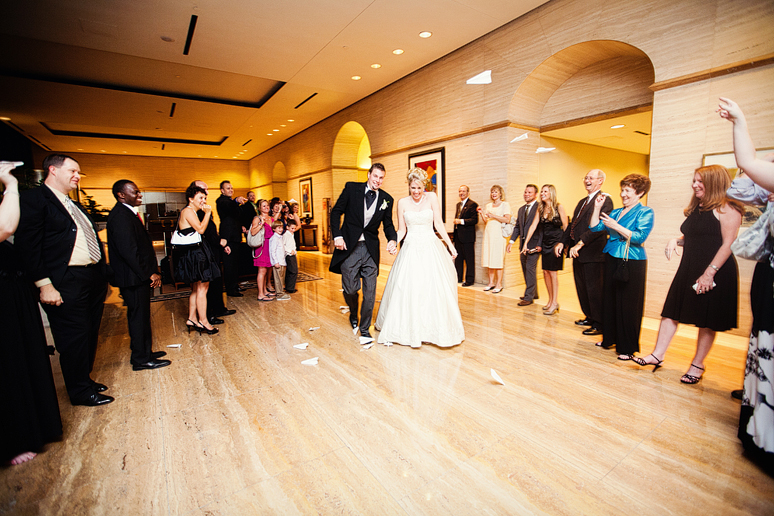 Paper airplane wedding grand exit inside City Club in Dallas Fort Worth