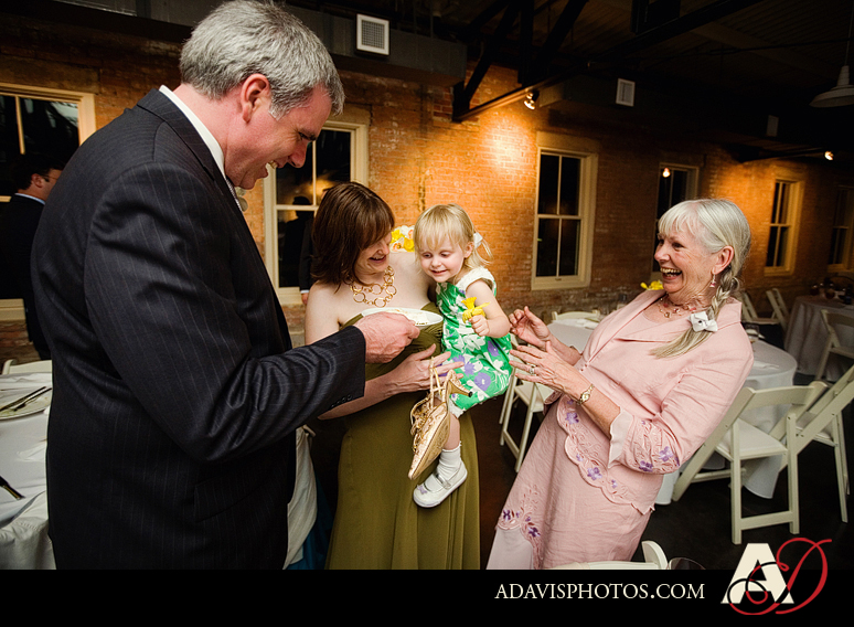 Dallas wedding reception cake cutting photographs at the Filter Building at White Rock Lake by Frisco Wedding Photographer Allison Davis Photography 