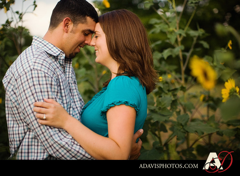 Romantic and modern country engagement portraits in a sunflower field by Dallas wedding photographer Allison Davis Photography